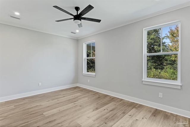9616 Indian Stone Ct Lot 8, Navarre, FL 32566 - empty room featuring baseboards, crown molding, visible vents, and light wood-type flooring