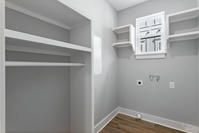9616 Indian Stone Ct Lot 8, Navarre, FL 32566 - laundry room with laundry area, hookup for an electric dryer, hookup for a washing machine, baseboards, and dark wood-style flooring