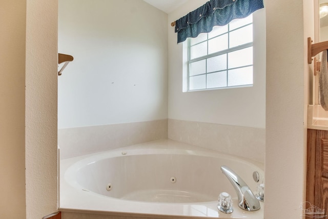 8206 Chumuckla Hwy, Pace, FL 32571 - full bathroom with a tub with jets