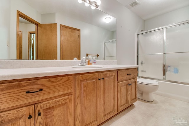 8206 Chumuckla Hwy, Pace, FL 32571 - full bath with vanity, toilet, and combined bath / shower with glass door