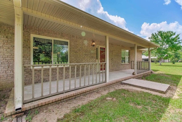 8206 Chumuckla Hwy, Pace, FL 32571 - porch featuring a lawn