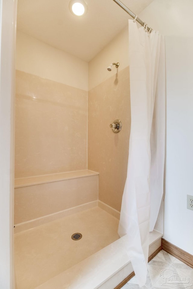 8206 Chumuckla Hwy, Pace, FL 32571 - bathroom with a shower with shower curtain and tile patterned flooring