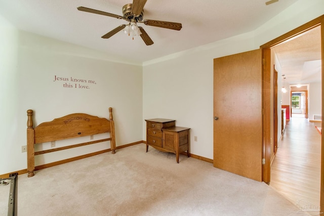 8206 Chumuckla Hwy, Pace, FL 32571 - carpeted bedroom featuring baseboards and ceiling fan