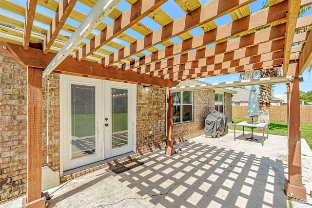 5773 Michael Dr, Milton, FL 32583 - view of patio / terrace with french doors, fence, and a pergola