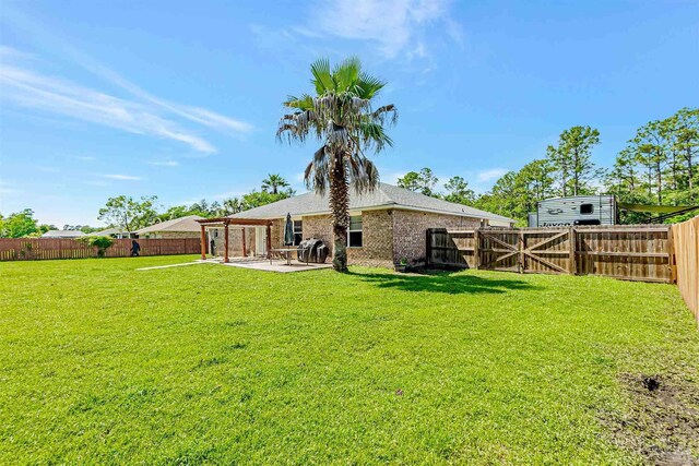 5773 Michael Dr, Milton, FL 32583 - view of yard with a patio area