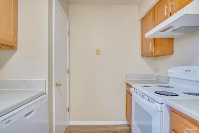 kitchen featuring light hardwood / wood-style floors and white appliances