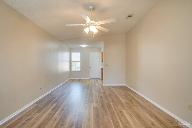 unfurnished room with a textured ceiling, hardwood / wood-style flooring, and ceiling fan