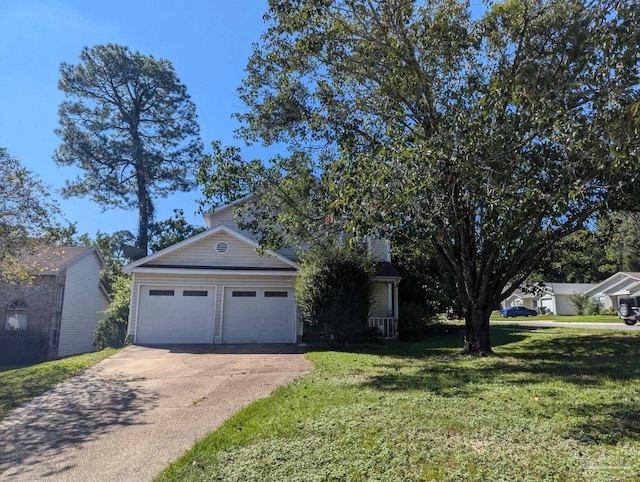 view of front facade with a garage and a front lawn