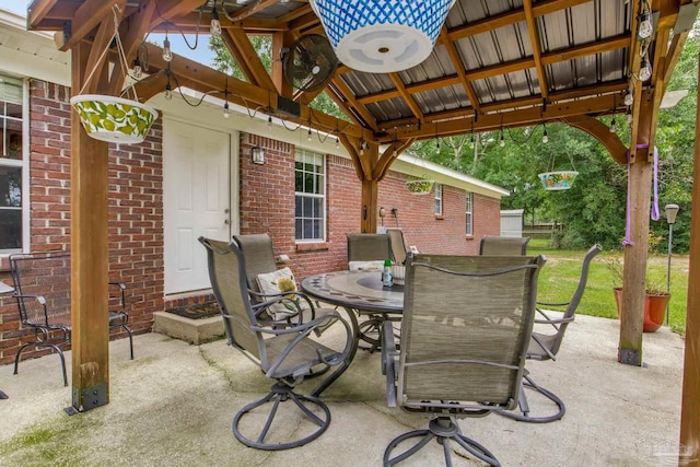 2661 Avenida De Sol, Navarre, FL 32566 - view of patio with a gazebo and outdoor dining space