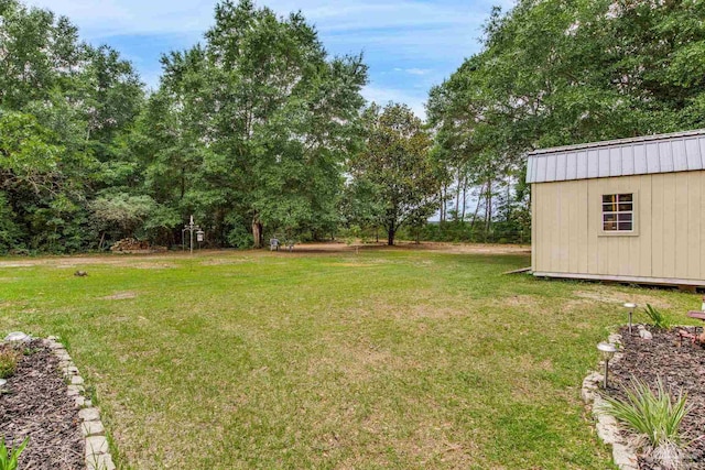 2661 Avenida De Sol, Navarre, FL 32566 - view of green lawn featuring an outdoor structure