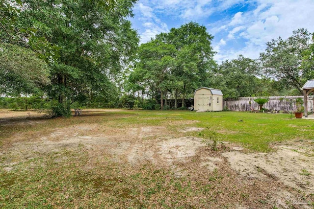 2661 Avenida De Sol, Navarre, FL 32566 - view of yard featuring a storage unit and view of scattered trees