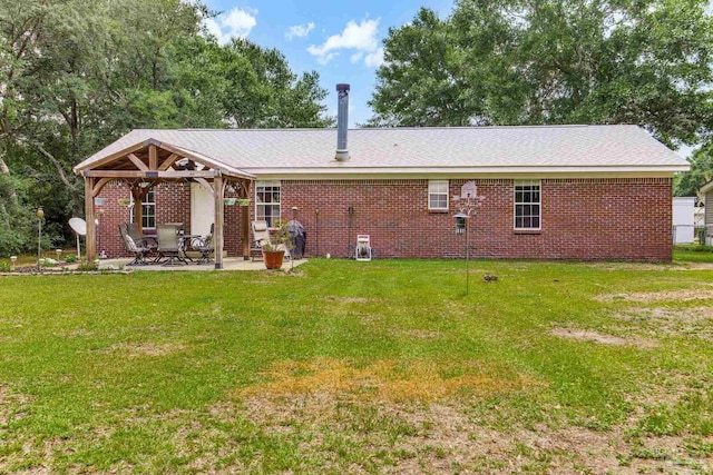2661 Avenida De Sol, Navarre, FL 32566 - back of house featuring a patio, a yard, a gazebo, and brick siding