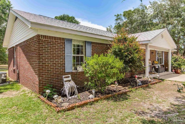2661 Avenida De Sol, Navarre, FL 32566 - view of front of property featuring brick siding and a shingled roof