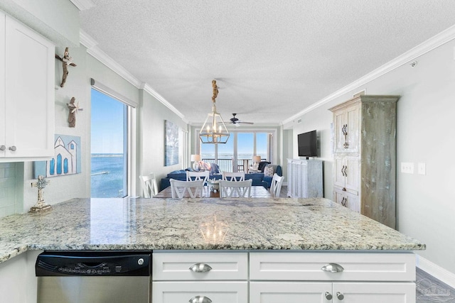 kitchen with white cabinets, stainless steel dishwasher, and light stone countertops