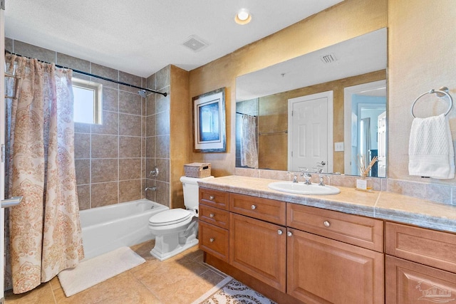 full bath featuring shower / bath combination with curtain, visible vents, toilet, vanity, and tile patterned floors