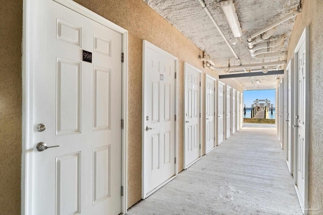 corridor with light wood finished floors