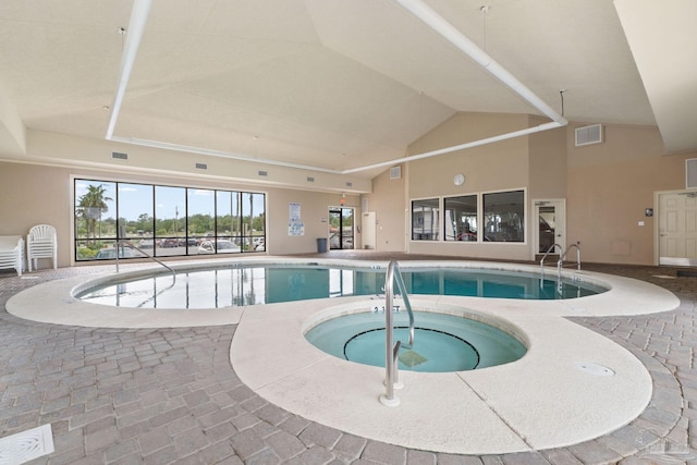 pool featuring an indoor in ground hot tub