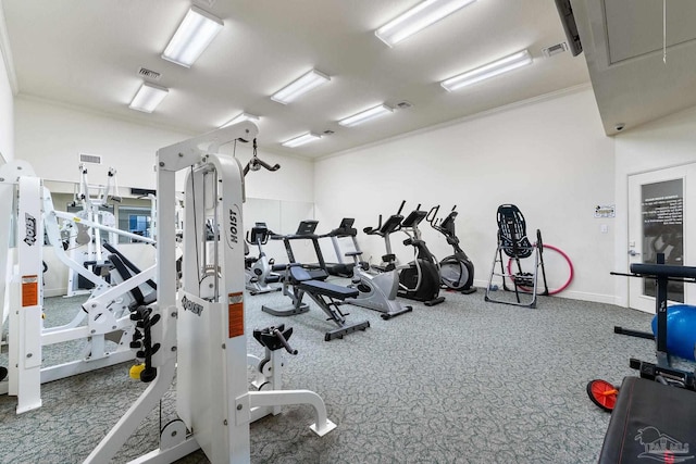 gym with visible vents and baseboards