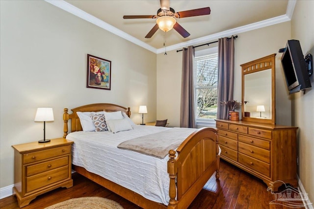 bedroom with dark wood-style floors, baseboards, ornamental molding, and a ceiling fan