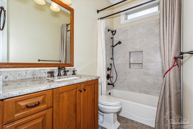 bathroom with toilet, shower / bath combo with shower curtain, and vanity