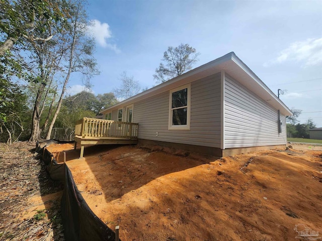 1581 Kyle Dr, Pensacola, FL 32505 - view of side of property featuring a deck