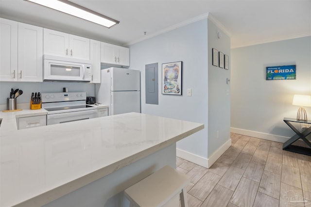 kitchen with white cabinetry, crown molding, white appliances, and light stone counters