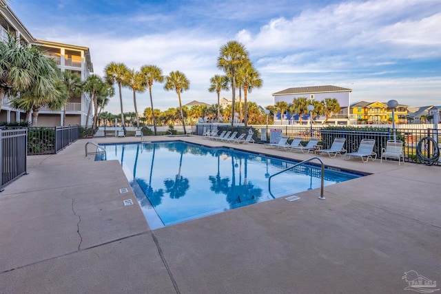 view of swimming pool with cooling unit