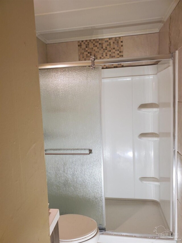 729 Lownde Ave, Pensacola, FL 32507 - full bathroom featuring a stall shower and toilet