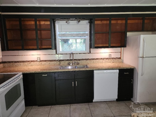 729 Lownde Ave, Pensacola, FL 32507 - kitchen featuring white appliances, a sink, light tile patterned floors, and light stone countertops