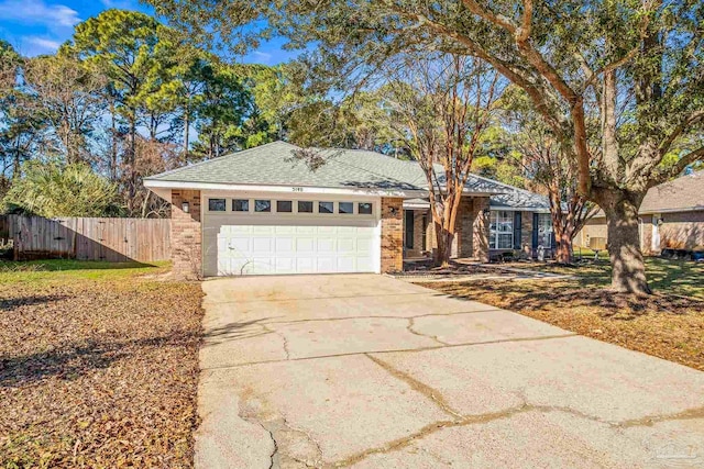 single story home featuring a garage