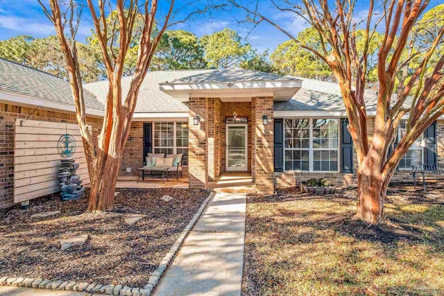 view of front of home featuring outdoor lounge area and a patio area