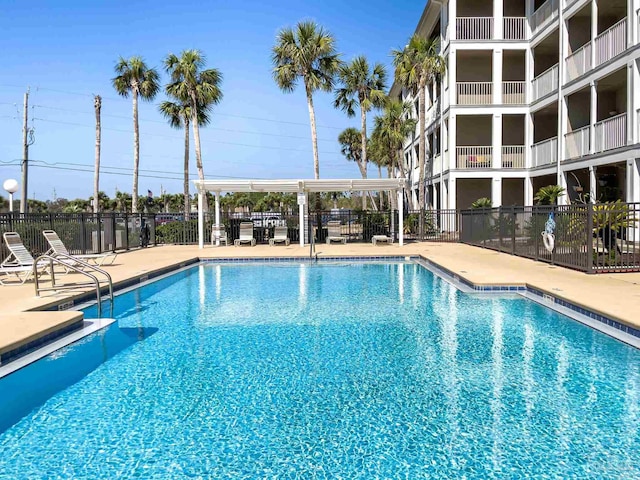 view of swimming pool featuring a patio