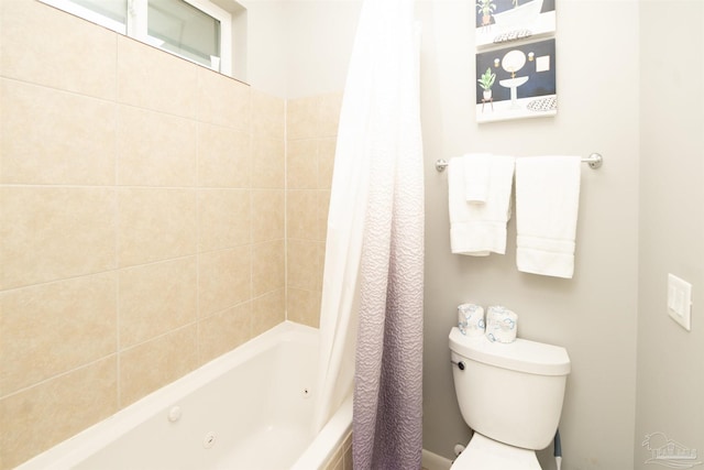 full bathroom with toilet and shower / tub combo