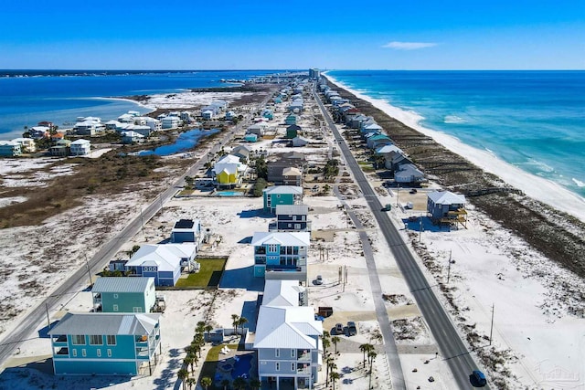 drone / aerial view with a view of the beach and a water view