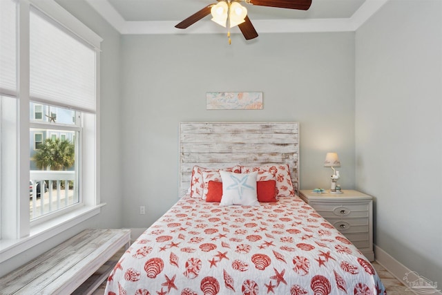 bedroom with hardwood / wood-style flooring and ceiling fan