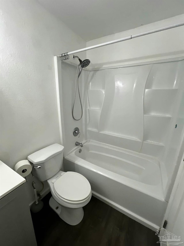 4285 W Avenida De Golf, Pace, FL 32571 - bathroom with toilet,  shower combination, vanity, and wood finished floors