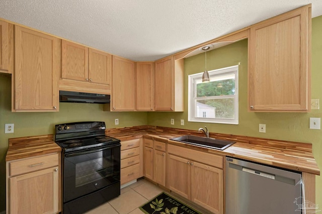 kitchen with black electric range oven, sink, stainless steel dishwasher, light tile patterned floors, and butcher block countertops