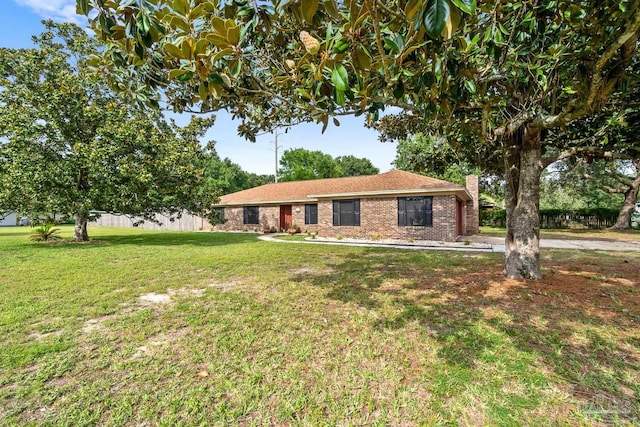 ranch-style house with a front yard