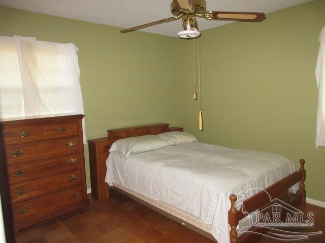 bedroom featuring ceiling fan