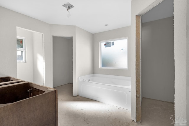 bathroom with a washtub