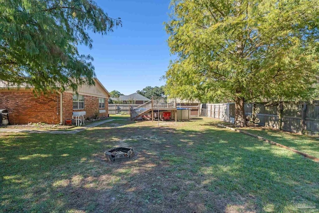 view of yard featuring a deck