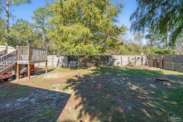 view of yard featuring a deck