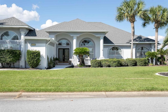 view of front facade with french doors and a front yard