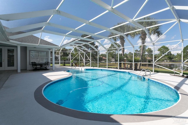 view of pool with a lanai and a patio area