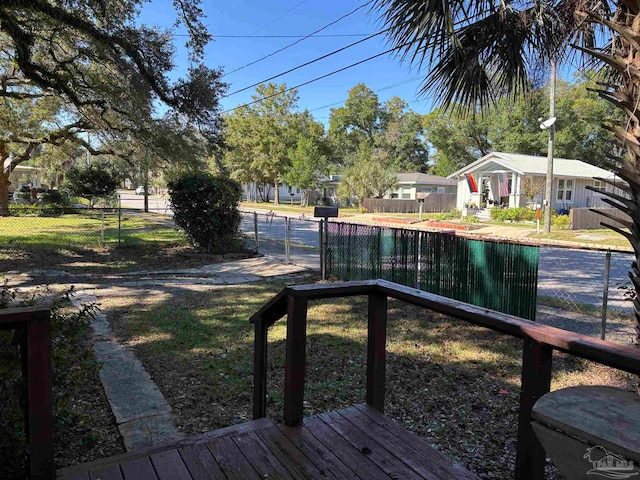 view of yard with a wooden deck