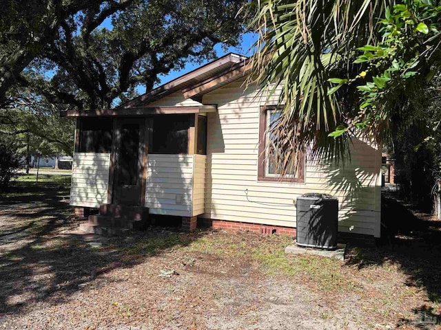 view of property exterior with cooling unit