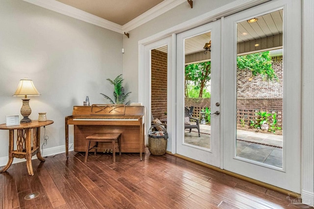 entryway featuring french doors, ornamental molding, and dark hardwood / wood-style floors