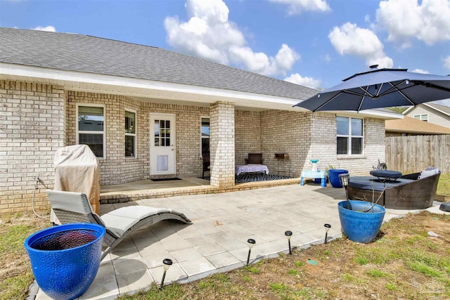 view of patio with fence