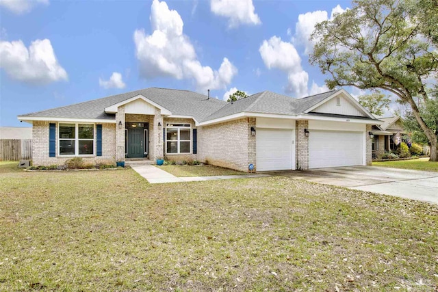 view of front of house with a garage, a shingled roof, concrete driveway, a front lawn, and brick siding