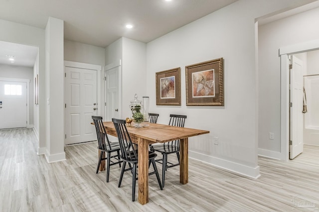 9777 Windy Hill Rd, Pensacola, FL 32526 - dining area featuring light wood-style flooring and recessed lighting